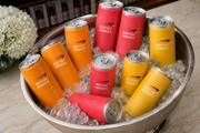 Branded fresh juice cans for events and catering.